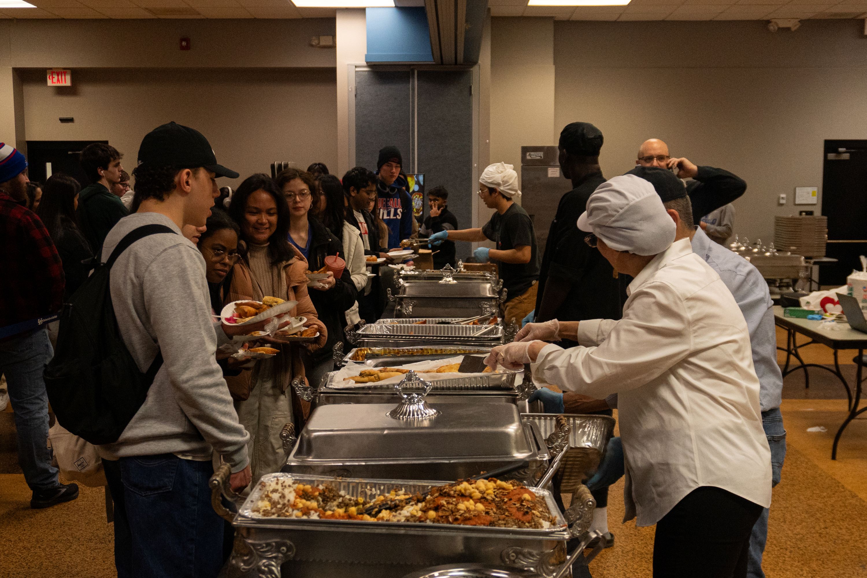 Crowd of students being served food